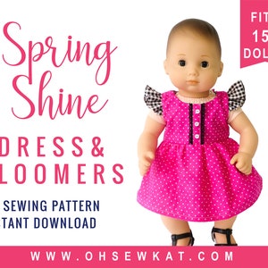 May include: A pink and white polka dot dress and bloomers sewing pattern for 15 inch dolls. The pattern is called "Spring Shine" and is available as an instant download. The website address is www.ohsewkat.com.