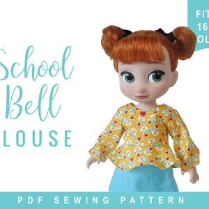 May include: A PDF sewing pattern for a yellow and red patterned blouse for a 16 inch doll. The pattern is called "School Bell Blouse".