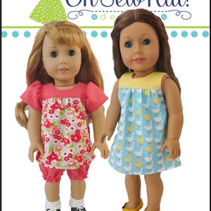 May include: Two dolls wearing matching outfits. The doll on the left is wearing a red and white floral dress with red bloomers and black and white sneakers. The doll on the right is wearing a blue dress with a yellow yoke and white ducks printed on it. Both dolls are wearing yellow shoes. The text "Oh Sew Kat!" and "Bloomer Buddies" is visible in the image.
