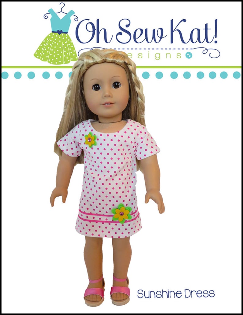 May include: A pink and white polka dot dress with yellow flower embellishments. The dress is designed for a doll and has a short-sleeved design. The dress is called "Sunshine Dress".