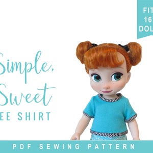 K&ouml;nnte beinhalten: Ein PDF-Schnittmuster f&uuml;r ein einfaches, s&uuml;&szlig;es T-Shirt f&uuml;r 40 cm Puppen. Das Schnittmuster enth&auml;lt Anleitungen zum N&auml;hen eines blauen T-Shirts mit schwarz-wei&szlig;em Besatz.
