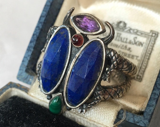 A magnificent rare Stephen Dweck Bug Ring with divine lapis, pear malachite and amethyst, rare magical ring.
