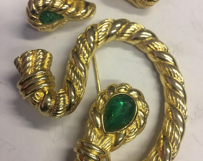 Vintage Christian Dior Brooch and earrings set with fabulous rare design. The perfect designer statement piece to add to any outfit.