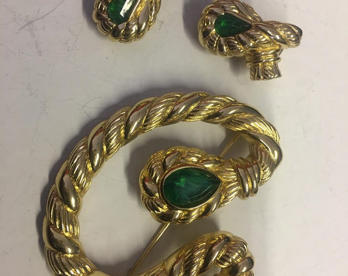 Vintage Christian Dior Brooch and earrings set with fabulous rare design. The perfect designer statement piece to add to any outfit.