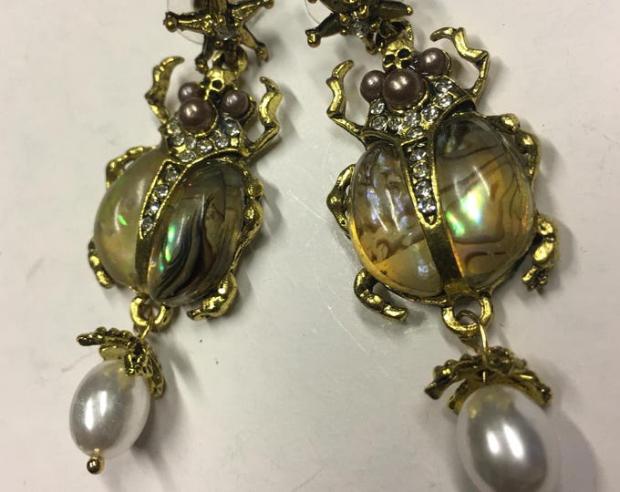Cool scarab earrings with divine style