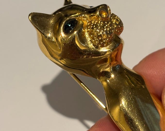 A stunning vintage tiger brooch made by the most famous designer D'Orlan.