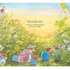 May include: A set of writing paper and envelopes featuring a whimsical illustration of mice in a field of flowers. The packaging has a yellow background with the text "Bramble Hedge" and "Writing Set 10 Sheets of Writing Paper with 10 Envelopes".