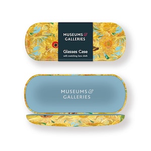 May include: An open glasses case with a sunflower painting design. The interior is light blue. The closed top of the case displays a vibrant yellow and blue floral pattern. The text "MUSEUMS & GALLERIES" is visible. Includes a matching lens cloth.
