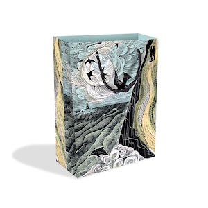 May include: A blue and white gift bag featuring a black and white illustration of a seascape with birds flying over a lighthouse. The bag has a black handle.