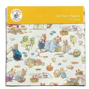 May include: A pack of 20 paper napkins featuring a whimsical illustration of mice enjoying a picnic in a garden setting. The napkins are 33 x 33 cm and feature a yellow background with a logo that says "Bramble Hedge".