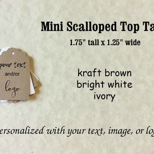May include: A stack of mini scalloped top tags in kraft brown, bright white, and ivory. The tags are 1.75 inches tall and 1.25 inches wide. The tags are personalized with your text, image, or logo.