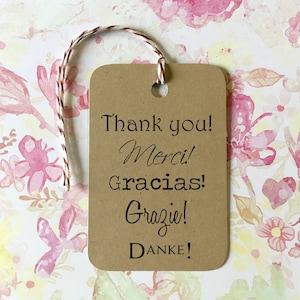 Thank You Tags - rectangular kraft tags rounded corners and bakers twine ties . merci, gracias, grazie, danke . printed tags for your shop