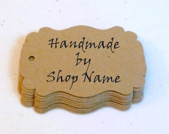 May include: A stack of brown, scalloped gift tags with the text "Handmade by Shop Name" printed in black.