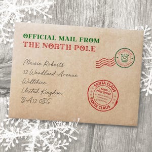 May include: A brown kraft paper envelope featuring the green and red text OFFICIAL MAIL FROM THE NORTH POLE. It includes a red Santa Claus Main Post Office stamp and a green Delivered by Reindeer Mail postmark, addressed to Maisie Roberts.