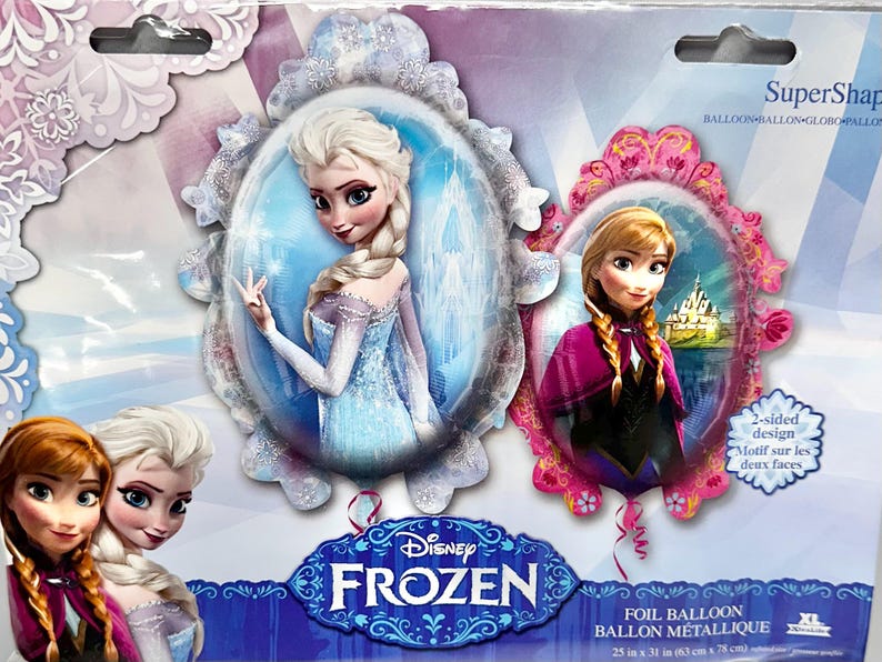 May include: A foil balloon featuring characters from Disney's Frozen. The balloon has two sides with different images of Elsa and Anna. The balloon is 25 inches by 31 inches.