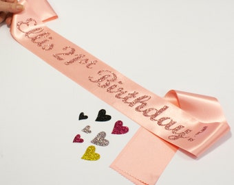 Personalised 21st Birthday Sash With Glitter Wording. Add your name or wording. Available in various combinations of ribbon & text colours