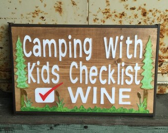 Camping With Kids Checklist... WINE handmade sign w/ black trim, coffee rubbed background, white lettering and trees (WH)