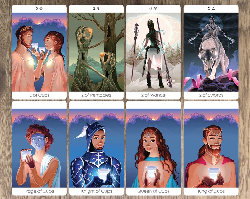 May include: Tarot card deck featuring illustrations of people and symbols. The cards are arranged in a grid of four rows and four columns. Each card has a different image and title. The cards are on a wooden background.