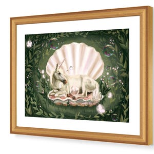 May include: A white unicorn with a pink horn lies in a large, pearl-coloured seashell. The shell is surrounded by green leaves and white flowers. There are several soap bubbles floating around the unicorn.