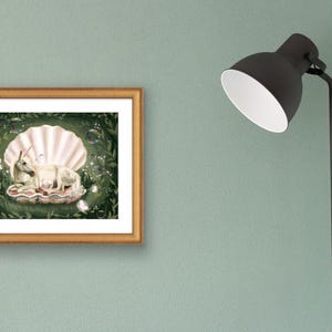May include: A white rabbit and a baby rabbit are nestled inside a large, pearl-coloured seashell. The shell is surrounded by green leaves and white flowers.