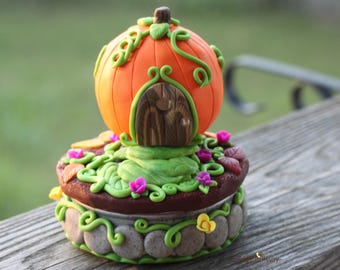 Casa de hadas en miniatura con forma de calabaza y luces