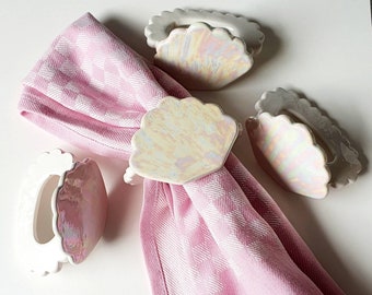 Set of 4 gorgeous pearly lustre handmade ceramic scallop shell napkin rings.Totally unique! Tablescaping/interior styling/dinner party decor