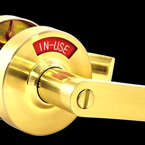 ADA Door Lock with Indicator in Satin Brass - Left-handed or right-handed used for amily, gender, assisted-use public toilets, offices.
