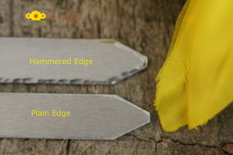 May include: Two gray slate signs with arrow shapes. The top sign has a hammered edge and the text "Hammered Edge". The bottom sign has a plain edge and the text "Plain Edge".