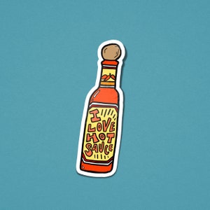 May include: A red and yellow cartoon hot sauce bottle with a white label that says "I LOVE HOT SAUCE".