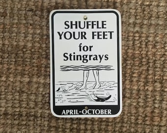 Shuffle Your Feet for Stingrays sign - Photo on Wood