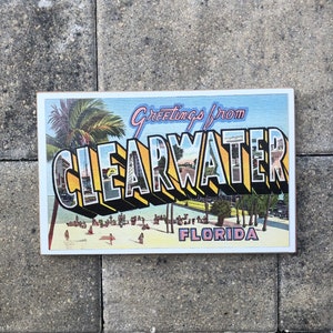 Greetings from Clearwater sign - photo on wood