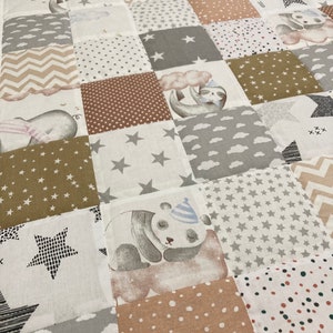 May include: A patchwork baby playmat featuring a range of animal designs, including a panda, a sloth, and an elephant. The playmat is made from soft, comfortable fabric and incorporates a variety of colours and patterns, such as brown, grey, white, and beige.