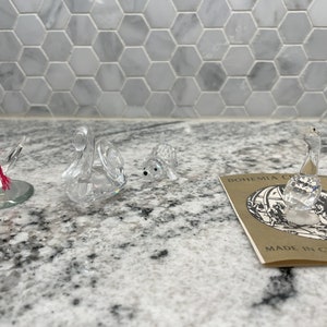 4 crystal figurines