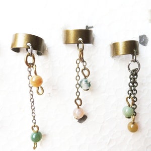 Movable earcuff earrings in brass/silver/gold colours with natural jasper stone beads and chain