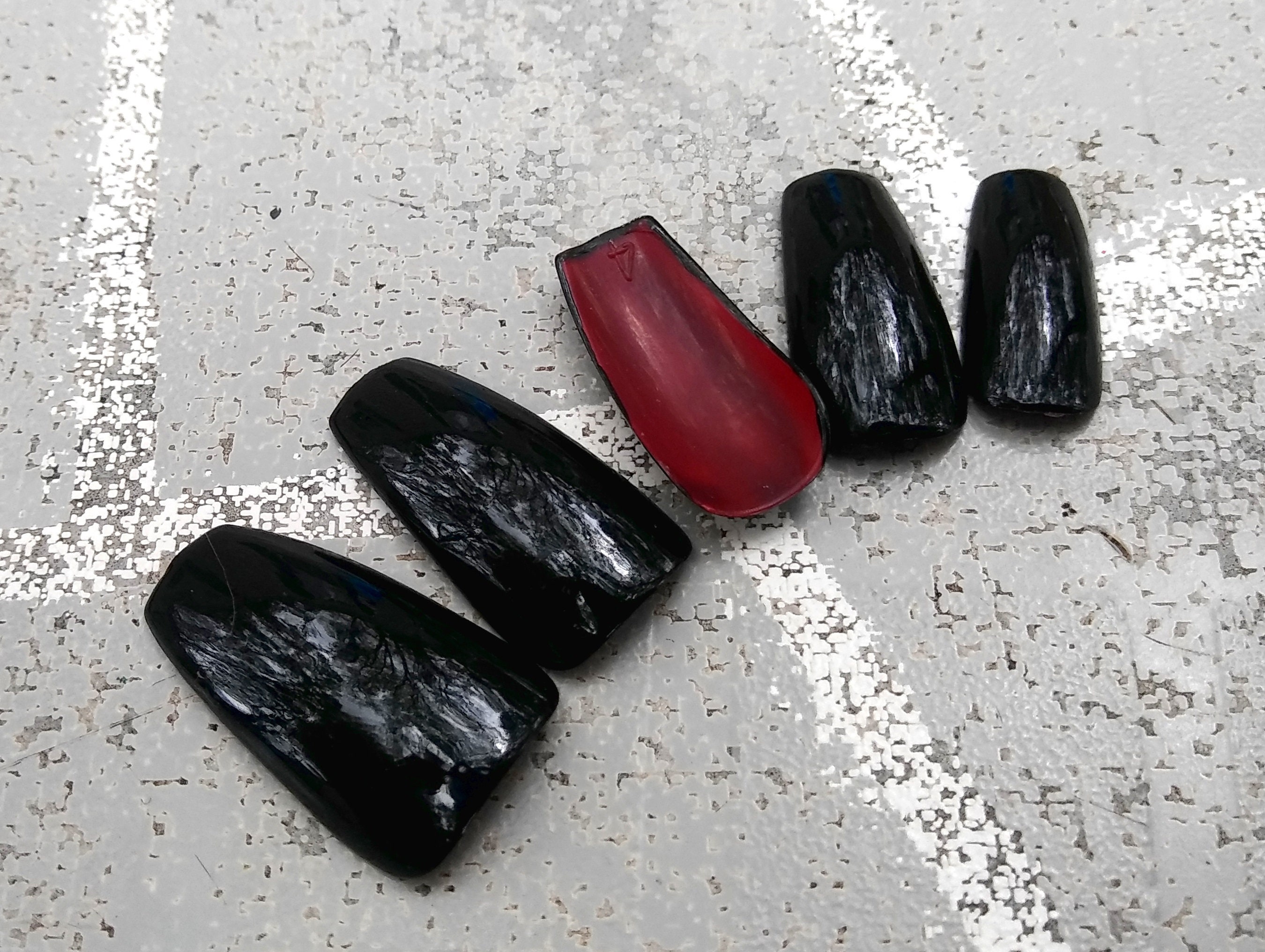 black nails red bottoms