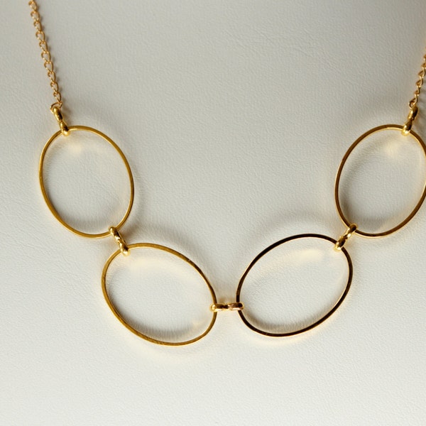 large gold circle necklace, gold circle necklace, connected circle necklace, multi circle gold necklace, gold eternity necklace