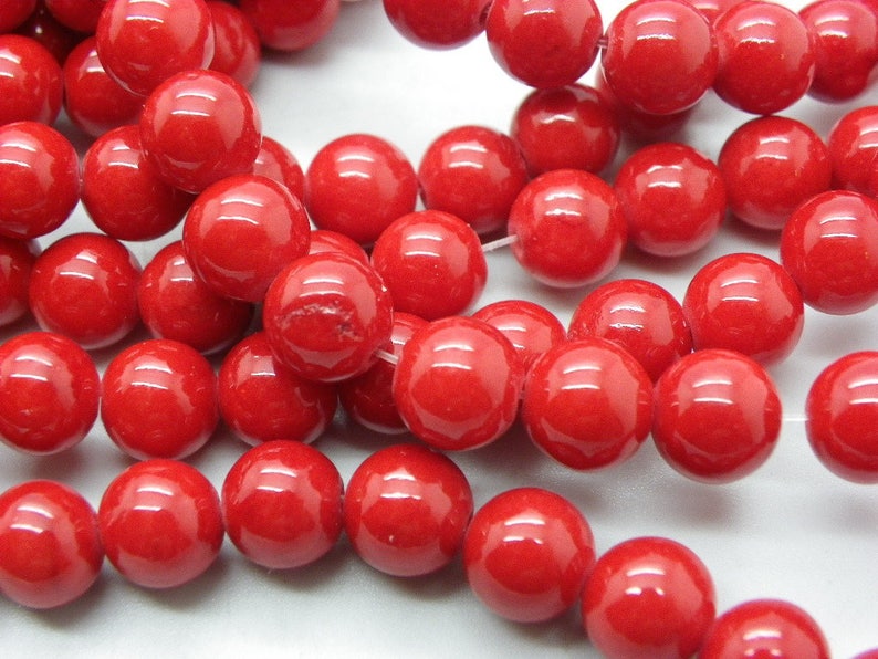 23 jades 8 mm round jade cherry red