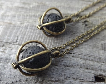 Diffuser Necklace. Lava bead Aromatherapy. Healing Necklace. Minimalist. Lava bead in antiqued brass cage. Essential oil diffuser