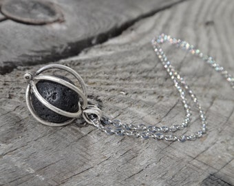 Halsband med diffusor av eteriska oljor. Silverfärgade lavastenar. Aromaterapi. Minimalistiskt halsband. Kedja i rostfritt stål. Hälsa