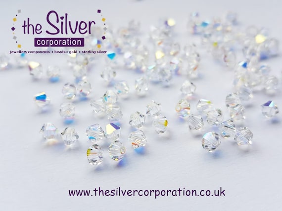 Swarovski 5328 4mm crystal AB xilion bicone beads austria crystal elements | pack sizes 6 / 12 / 24 / 50 / 100  [our ref: pb1057]