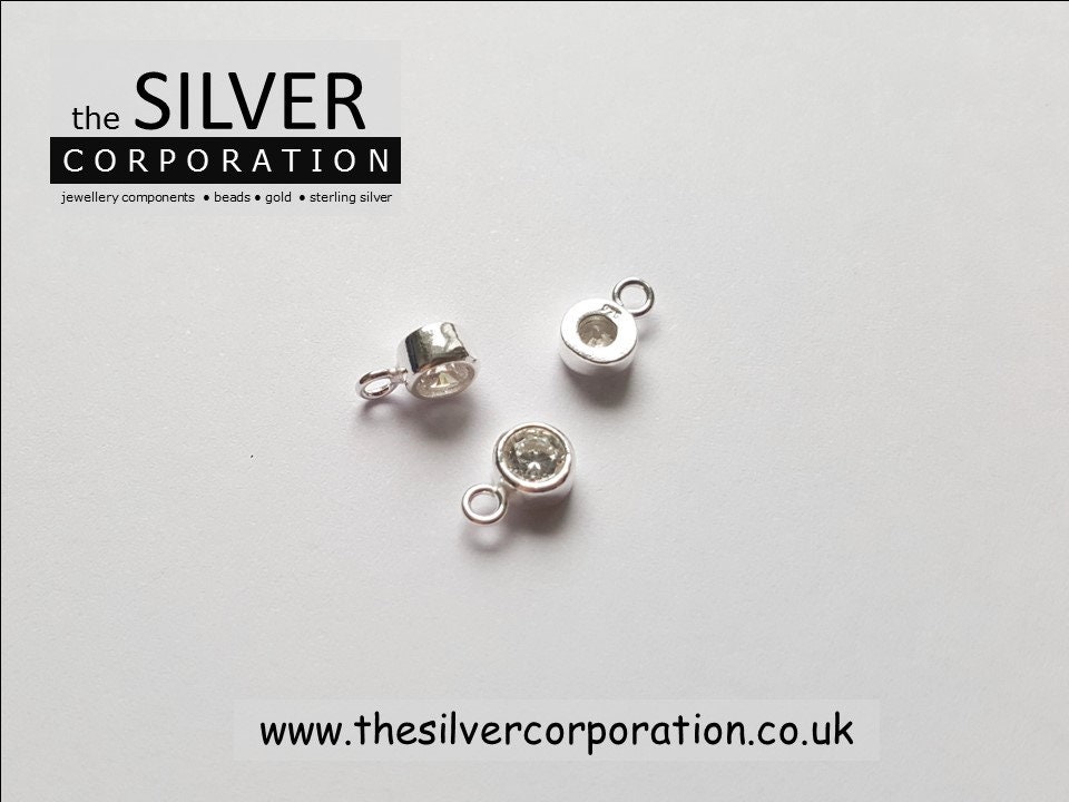 Sterling Silver 8.35mm X 5.15mm Clear Cubic Zirconia +
