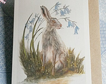 Hare and Bluebells.  Watercolour hare. Norfolk Hare. Hare in summer. Hare painting. Hare card. Hare with wild flowers. Hare image. Wildlife