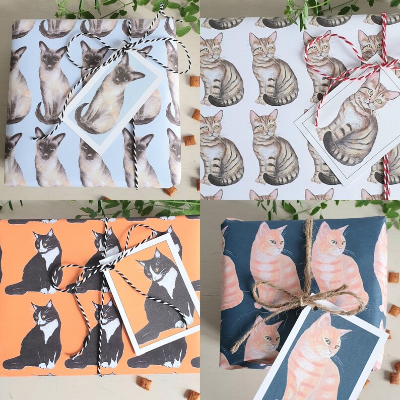 May include: Four gift-wrapped boxes with different cat-themed wrapping paper. Each box has a different color scheme and pattern. The boxes are tied with twine and have gift tags attached.