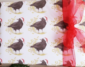 Crow Christmas wrapping paper. wrapping paper with a crow. gift wrap with a crow. crow gift wrap. crow art. crow paper. crow gift. corvid