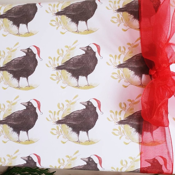 Crow Christmas wrapping paper. wrapping paper with a crow. gift wrap with a crow. crow gift wrap. crow art. crow paper. crow gift. corvid