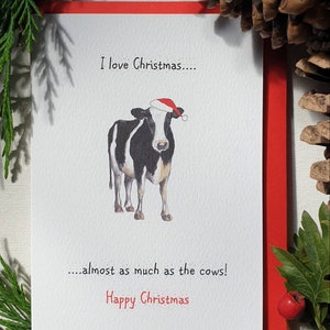 Carte de Noël de vache. Carte de Noël avec une vache. Drôle de carte de Noël. Carte de Noël de vache. Drôle de carte de Noël de vache