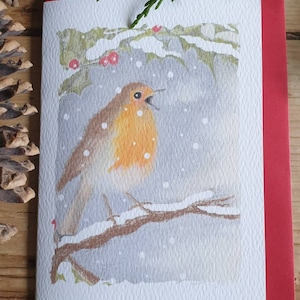 Carte de Noël Robin. Robin dans la neige. rouge-gorge d’hiver. carte de Noël avec un rouge-gorge. oiseau de jardin. oiseau britannique. rouge-gorge. carte d’oiseau
