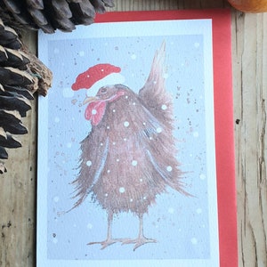 Carte de Noël au poulet. Carte faite à la main. carte avec un poulet. carte de Noël drôle de poulet. cadeau pour les amateurs de poulet. cadeau de poulet. Poulet