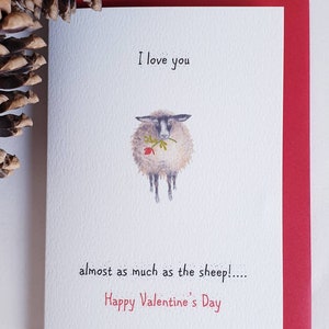 Schaf-Valentinstagskarte. Witzige Karte zum Valentinstag. Schaf lustige Karte. Schaf mit einer Rose. Schaf präsent. Schaf-Karte. Romantische Karte