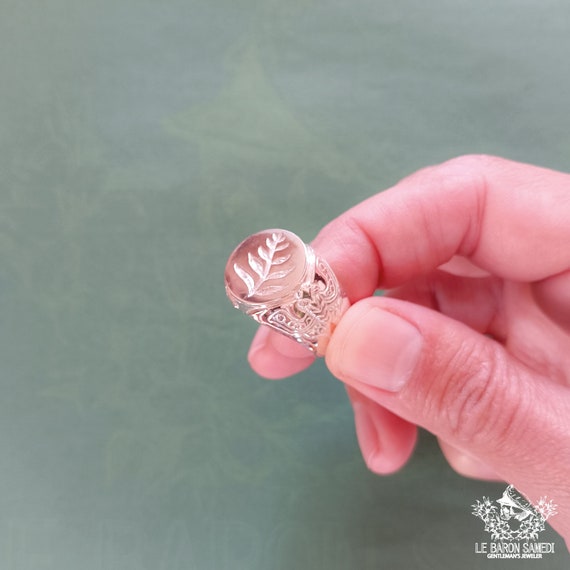 ELLIE RING - A sterling silver signet ring inspired by The Last of Us, featuring an engraved fern and sculpted night moth on the sides